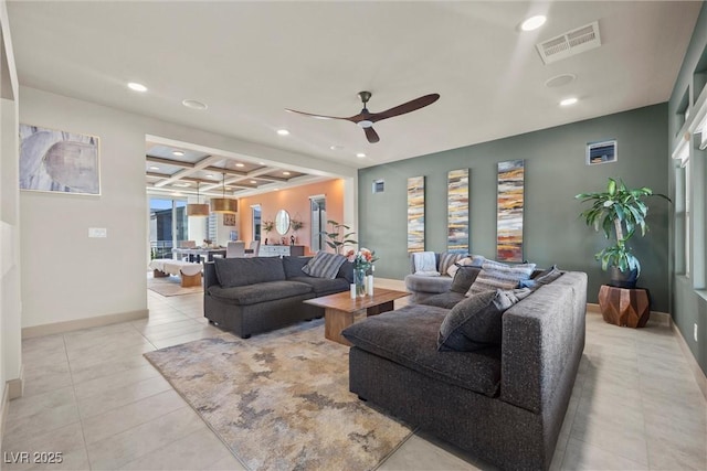 living room featuring beamed ceiling, ceiling fan, coffered ceiling, and light tile patterned floors