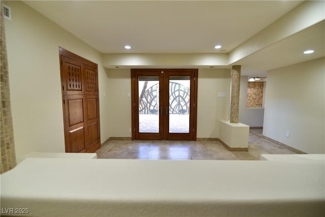 foyer featuring french doors