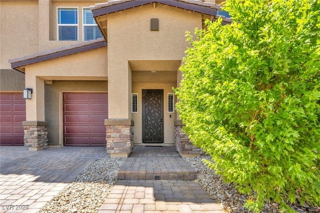 property entrance with a garage