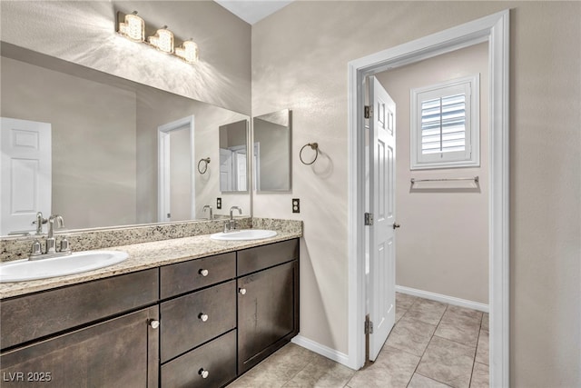 bathroom featuring vanity and tile patterned floors