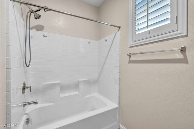 bathroom featuring washtub / shower combination