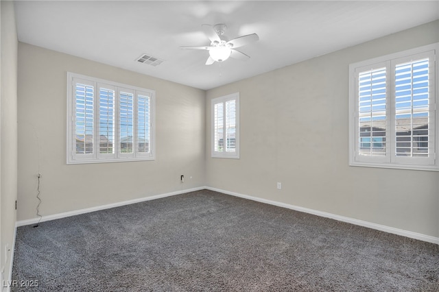 carpeted empty room with ceiling fan