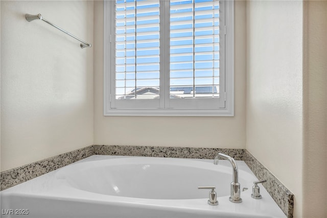 bathroom featuring a bathing tub