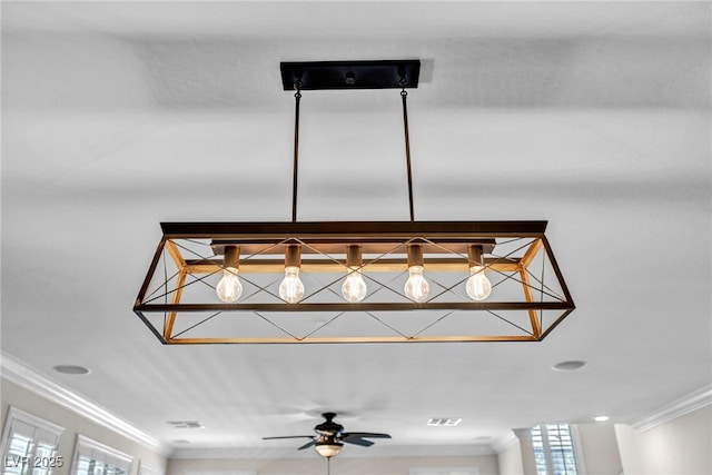 details featuring crown molding and ceiling fan