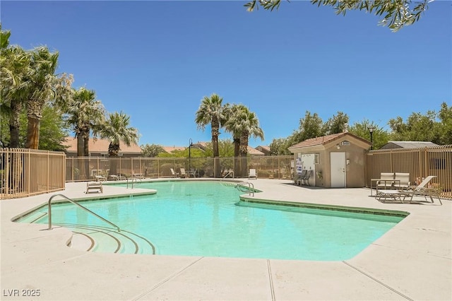 view of swimming pool featuring a patio