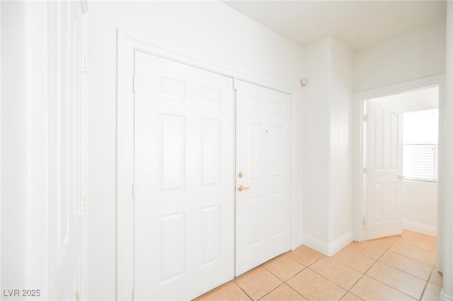 foyer with light tile patterned floors