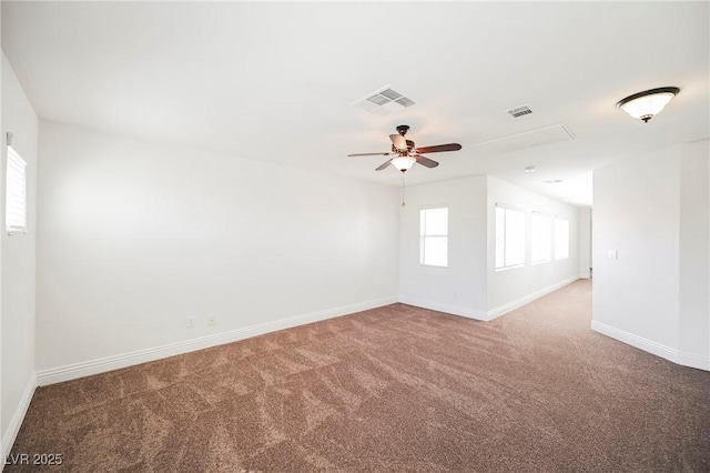 unfurnished room with carpet and ceiling fan