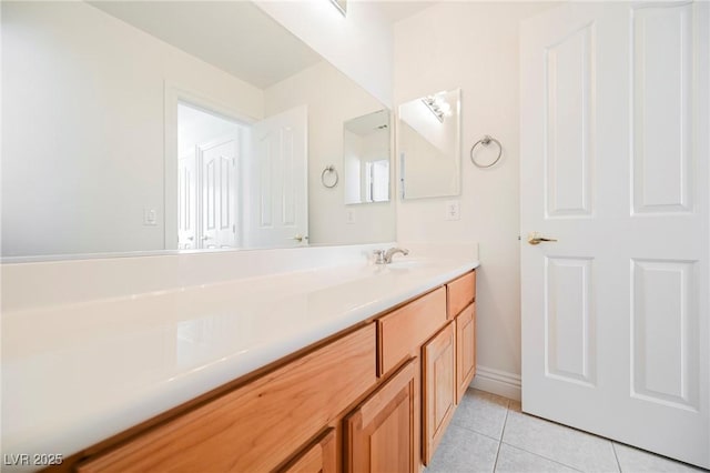 bathroom with vanity and tile patterned floors