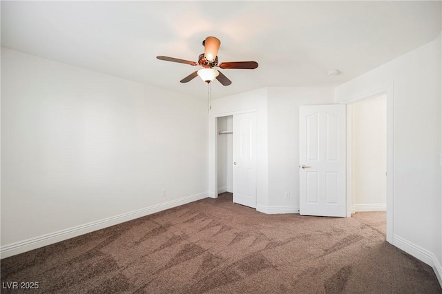 unfurnished bedroom with ceiling fan, carpet floors, and a closet