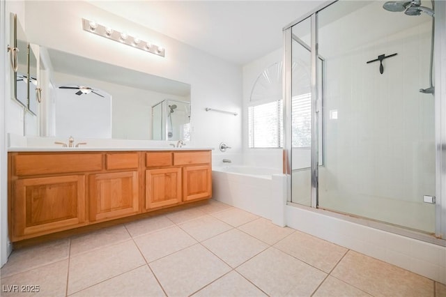 bathroom featuring ceiling fan, vanity, shower with separate bathtub, and tile patterned flooring