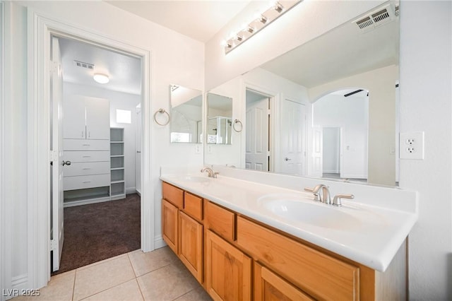 bathroom with vanity and tile patterned floors