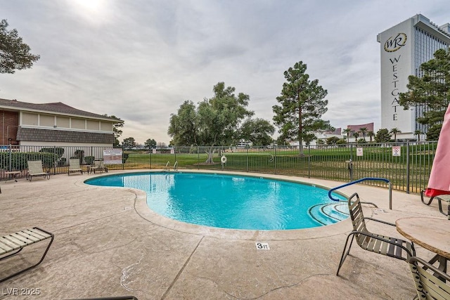 view of pool featuring a patio