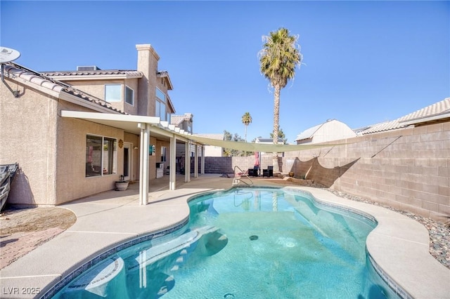 view of pool with a patio area