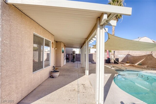 view of pool with a patio