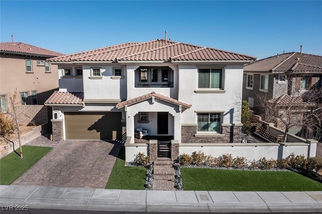 mediterranean / spanish-style home featuring a garage