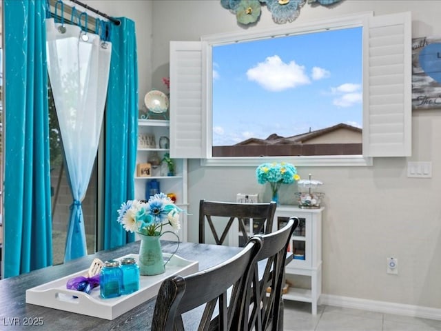 view of tiled dining space