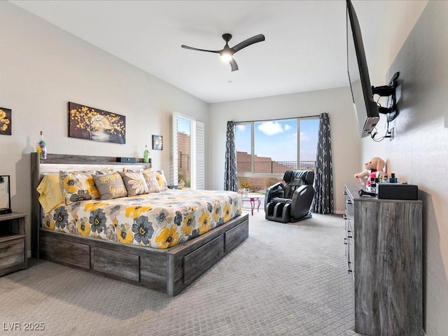 carpeted bedroom with ceiling fan and access to outside