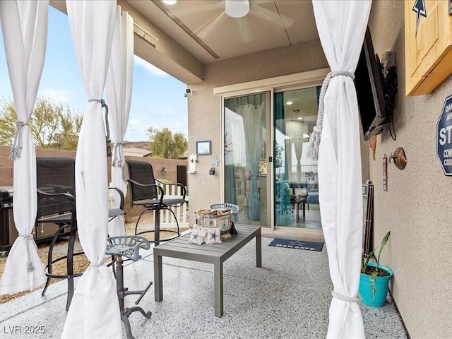 view of patio with ceiling fan