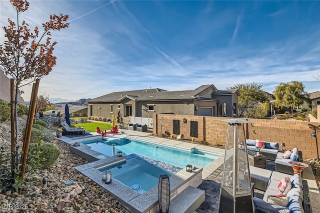 view of pool featuring an in ground hot tub and outdoor lounge area