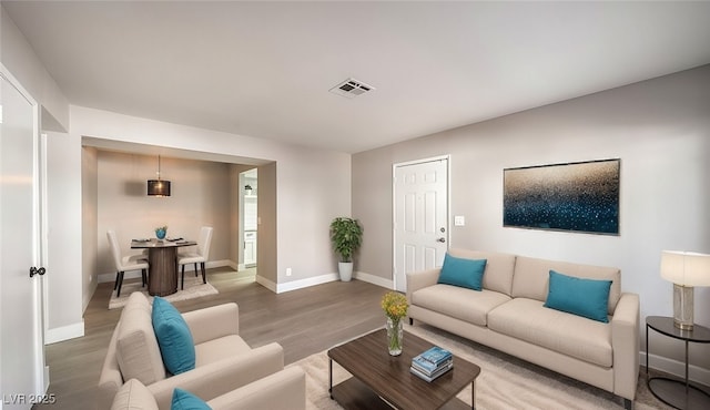 living room with hardwood / wood-style floors