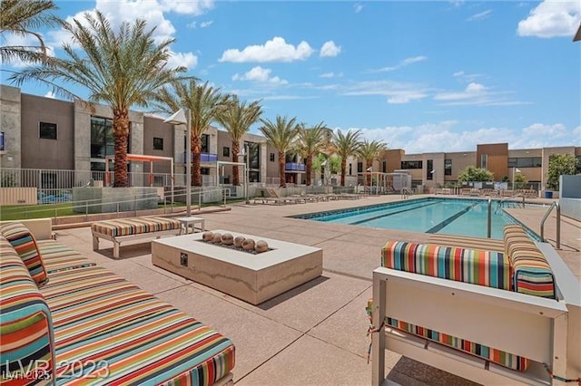 view of swimming pool with a patio