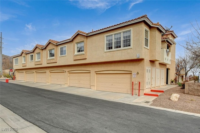 view of front of property with a garage