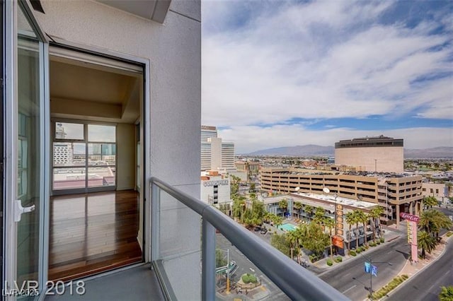 balcony featuring a mountain view