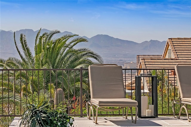 balcony featuring a mountain view