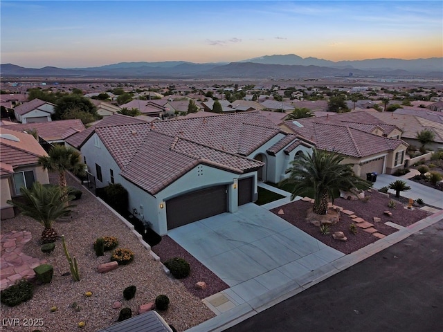 aerial view at dusk with a mountain view