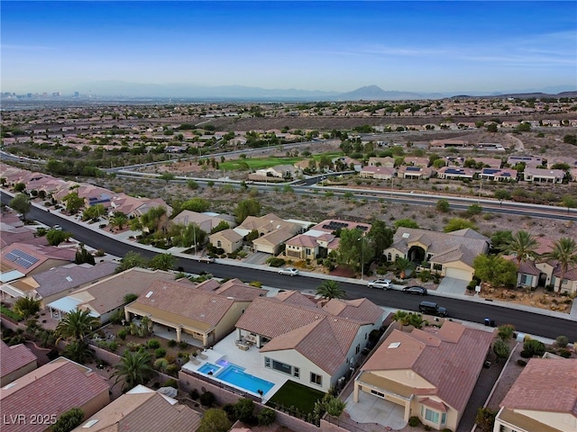 drone / aerial view featuring a mountain view