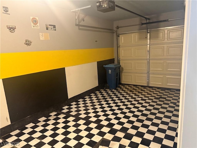 garage featuring a garage door opener