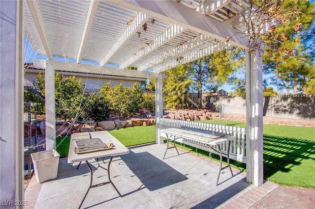 view of patio featuring a pergola