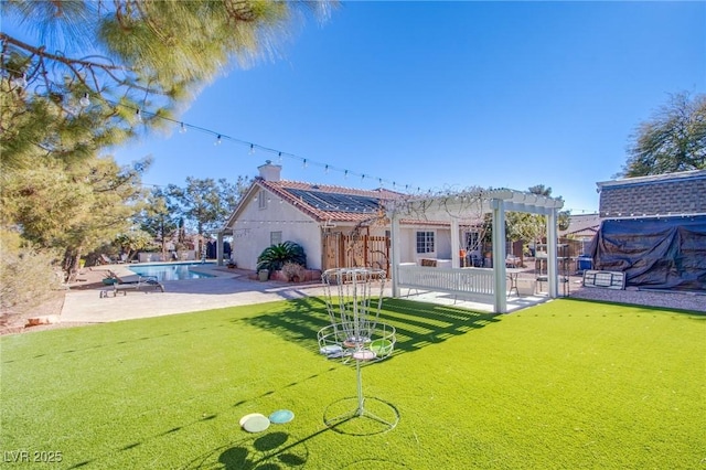 back of house with a patio and a pergola