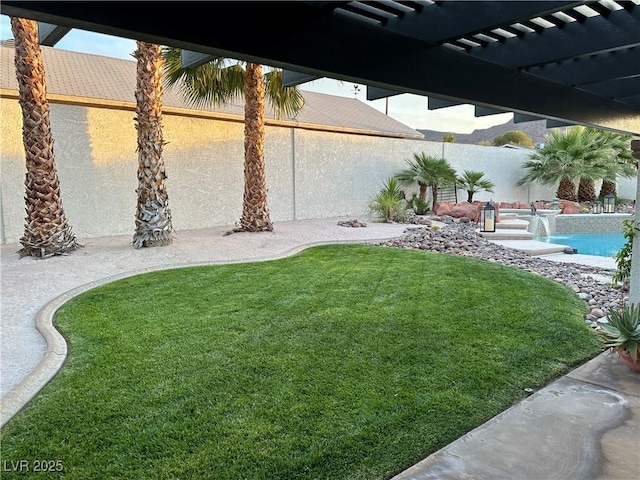 view of yard featuring a fenced backyard and a fenced in pool