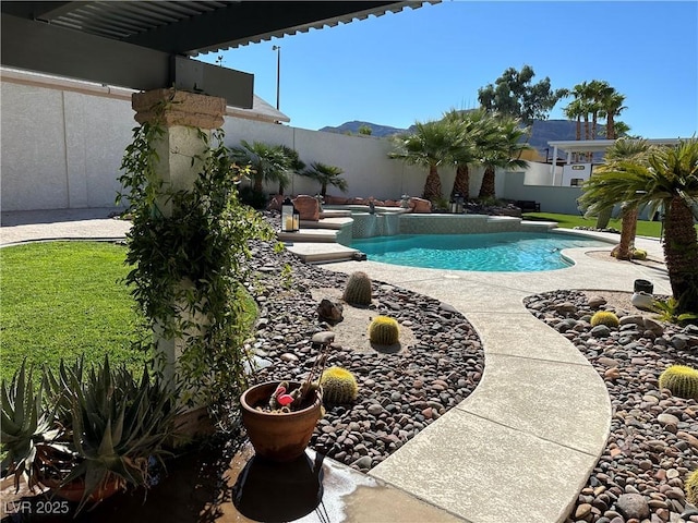 view of pool with a patio, a fenced backyard, and a fenced in pool