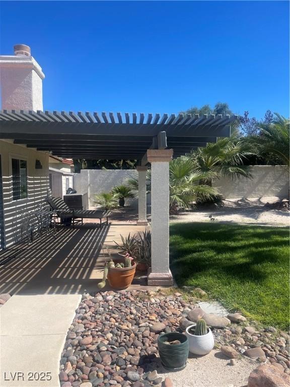 view of patio / terrace featuring a pergola