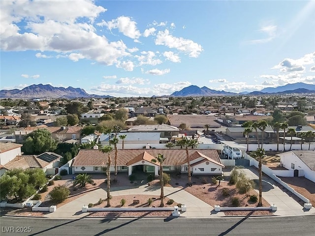 bird's eye view with a mountain view and a residential view