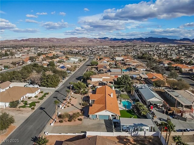 birds eye view of property with a residential view and a mountain view