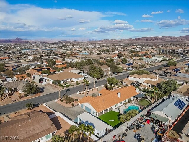 aerial view featuring a residential view and a mountain view