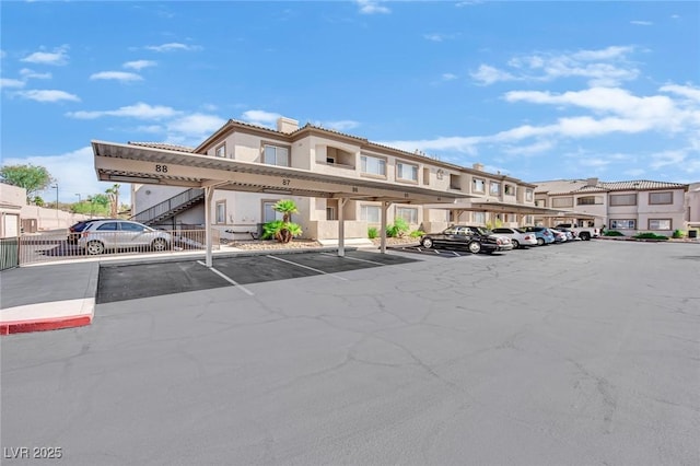 view of car parking with a carport