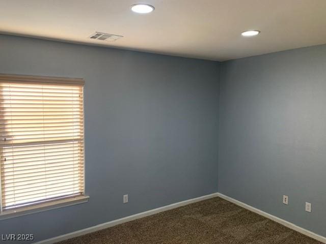 view of carpeted spare room