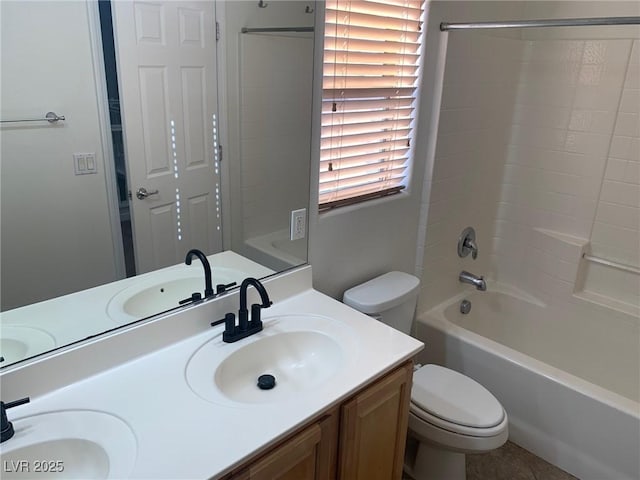 full bathroom with vanity,  shower combination, and toilet