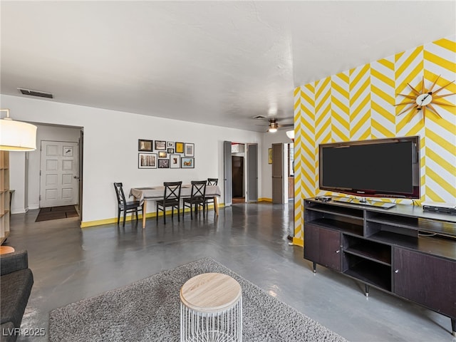 living room featuring ceiling fan