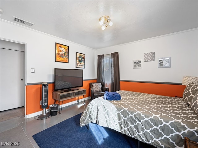 bedroom with crown molding, concrete floors, and a textured ceiling