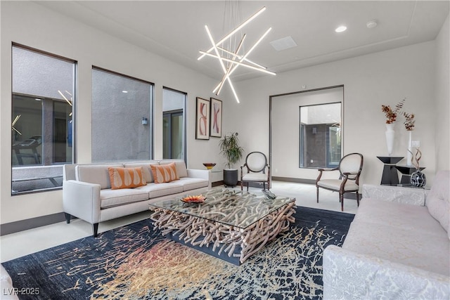 living room with a notable chandelier