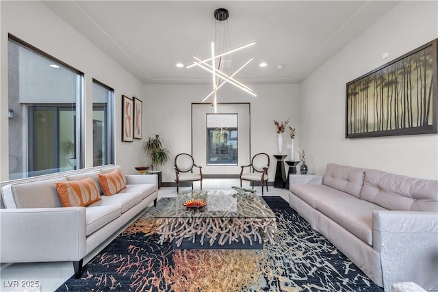 living room with a notable chandelier