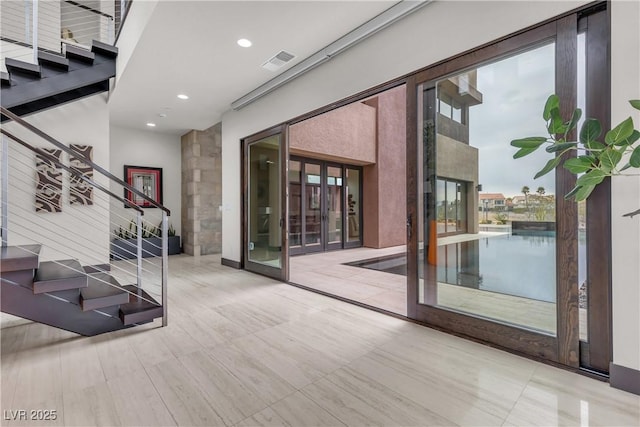 entryway featuring french doors