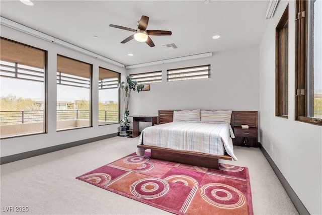 carpeted bedroom with ceiling fan