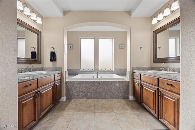 bathroom featuring tile patterned floors and vanity