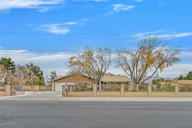 ranch-style house featuring a garage